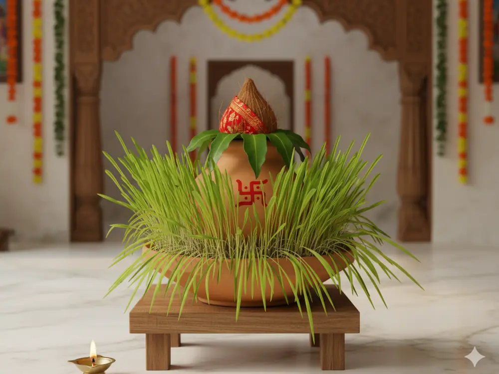 Navratri kalash with coconut and sprouted barley on a wooden stool before a carved arch